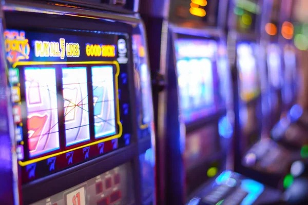 slot joss app interface showing live football markets and slot games